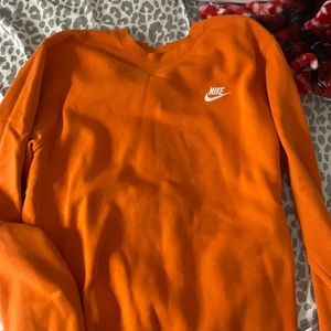 orange Nike crewneck